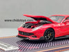 U2 Ferrari DMC F12 1:64 rojo en resina, con cofre abatible, motor detallado, rines negros, llantas de goma y capelo.
