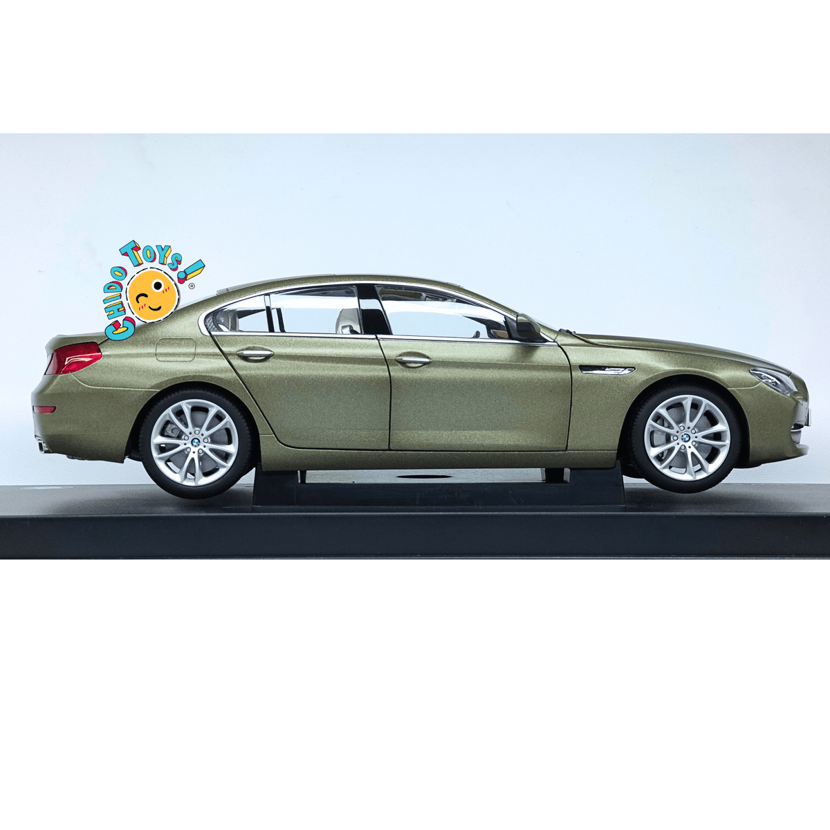 BMW 650i Gran Coupé F06 Dealer Edition 1:18 Frozen Bronze con apertura total - Chido Toys