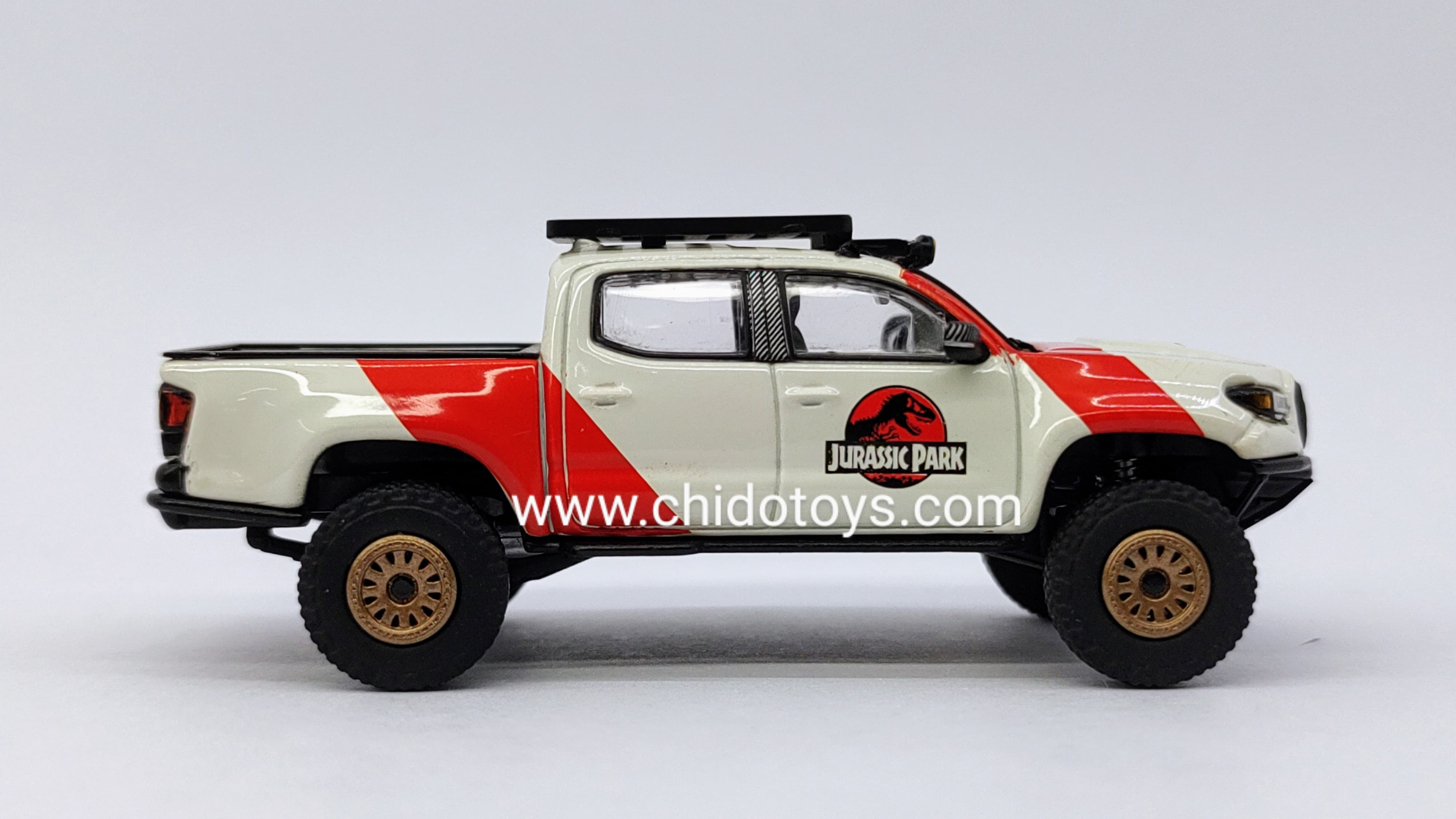 Camioneta a escala marca GCD, Modelo Toyota Tacoma Jurassic - Chido Toys