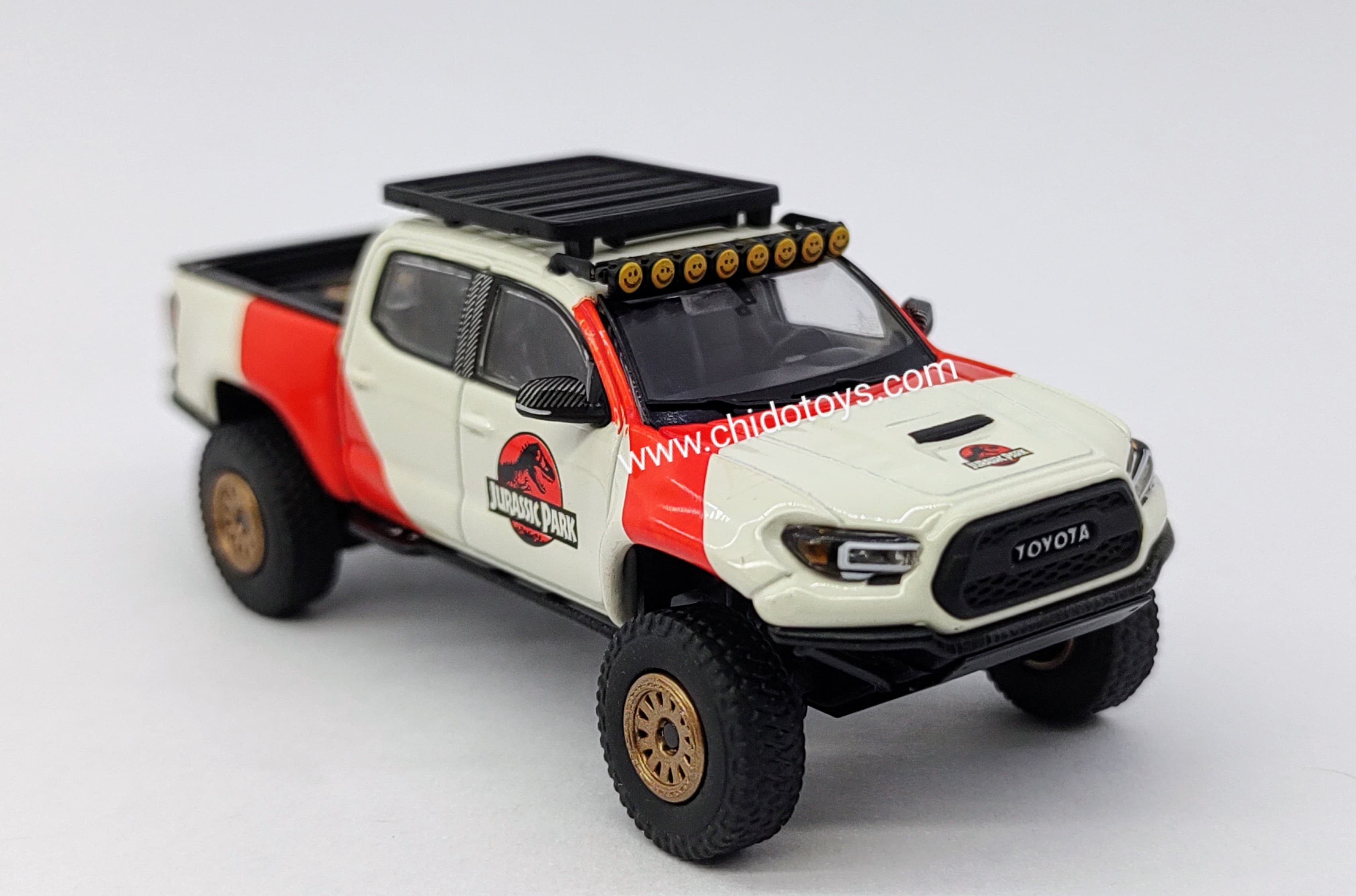 Camioneta a escala marca GCD, Modelo Toyota Tacoma Jurassic - Chido Toys