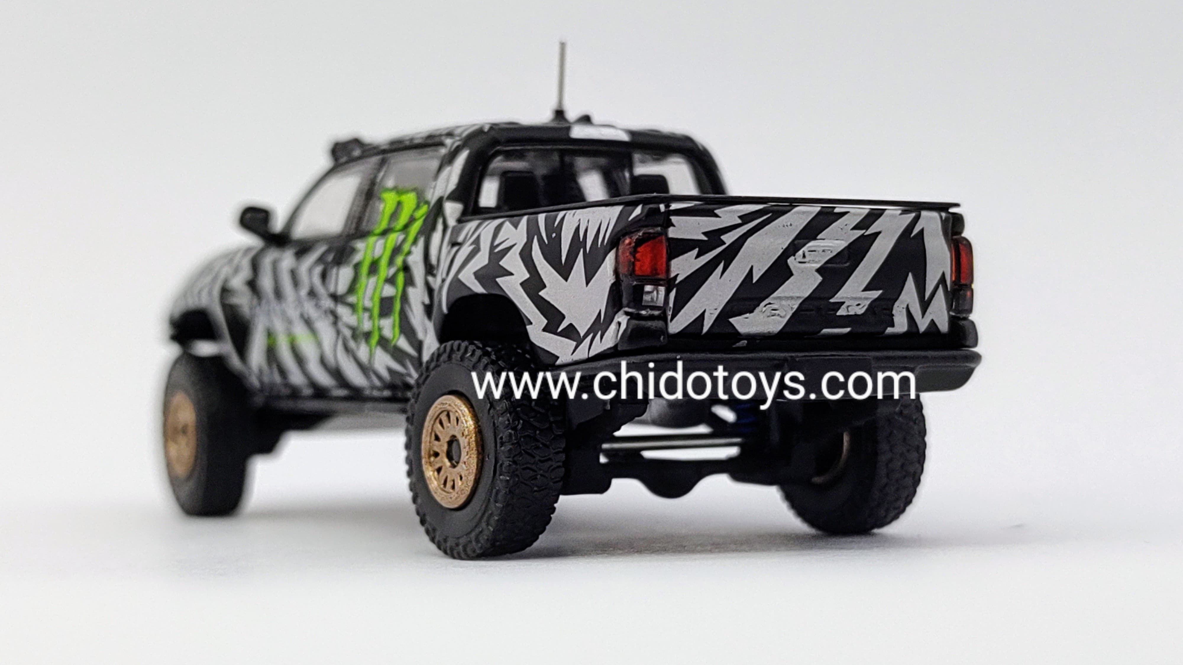 Camioneta a escala marca GCD, Modelo Toyota Tacoma Monster. - Chido Toys