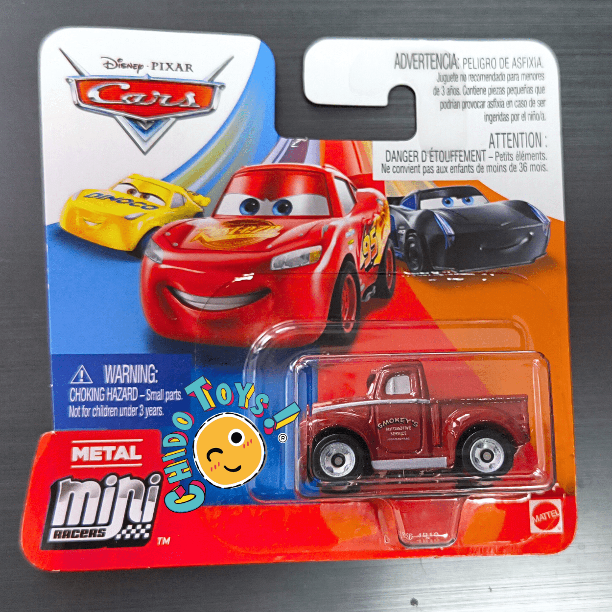 Disney Pixar Cars Mini Racers Smokey 2019 – Versión Metal – Mattel - Chido Toys