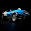 Hot Wheels RLC AMC Javelin AMX 1:64 tricolor Spectraflame, con Real Riders Goodyear y motor V8 expuesto.