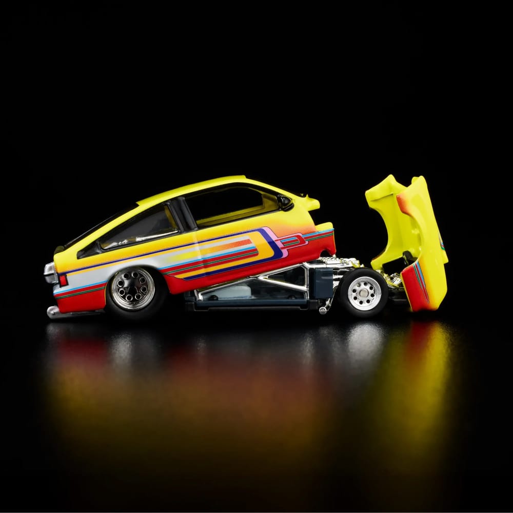 Hot Wheels RLC 1985 Pontiac J2000 1:64 Amarillo con Cofre Abatible - Chido Toys