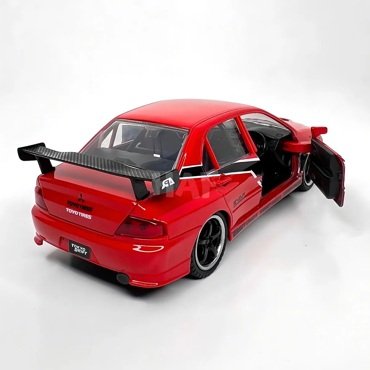 Jada Fast & Furious Lancer Evolution IX 1:32 rojo, puertas abatibles - Chido Toys