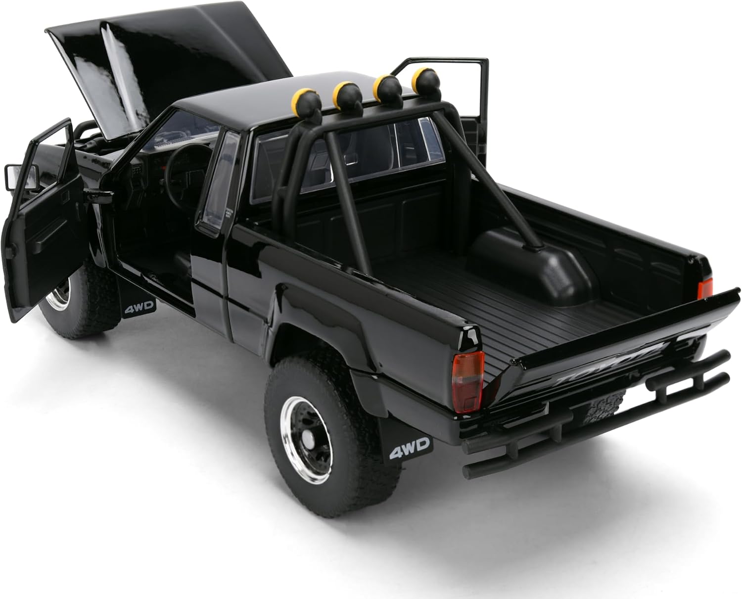 Jada Hollywood Rides Toyota SR5 Pickup 1985 1:24 negra con skateboard - Chido Toys