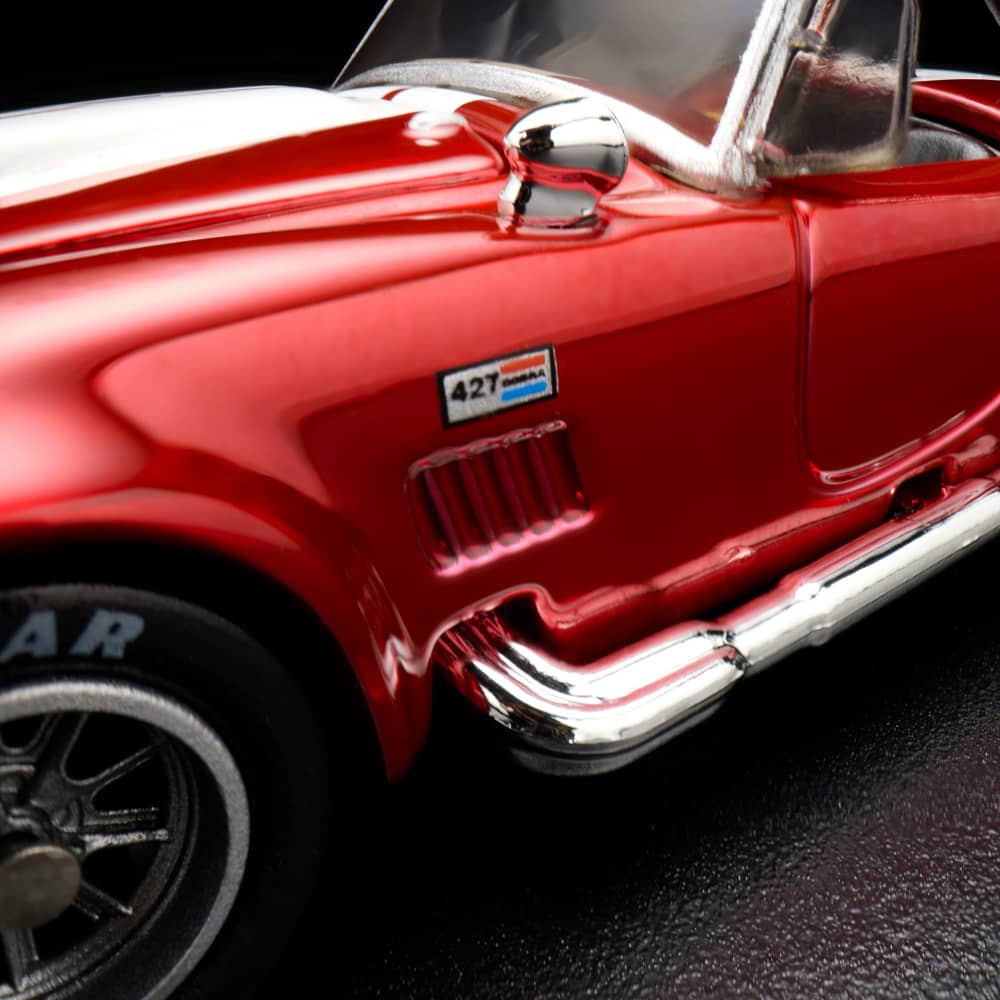 Hot Wheels RLC 1965 Shelby Cobra 427 S/C 1:64 Spectraflame Red con cofre abatible