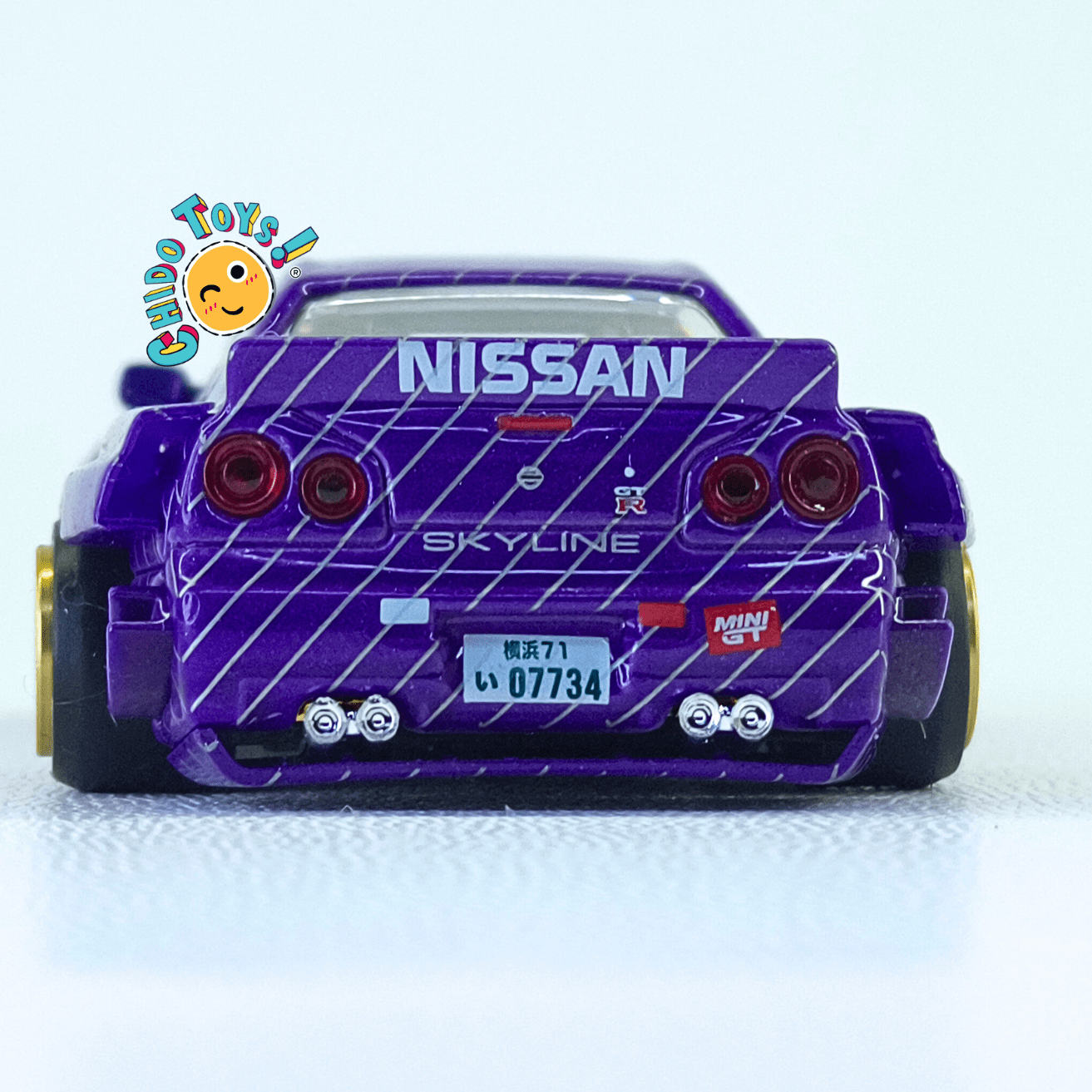 Kaido House 048 Nissan Skyline GT - R R34 CHASE 1:64 rines dorados - Chido Toys