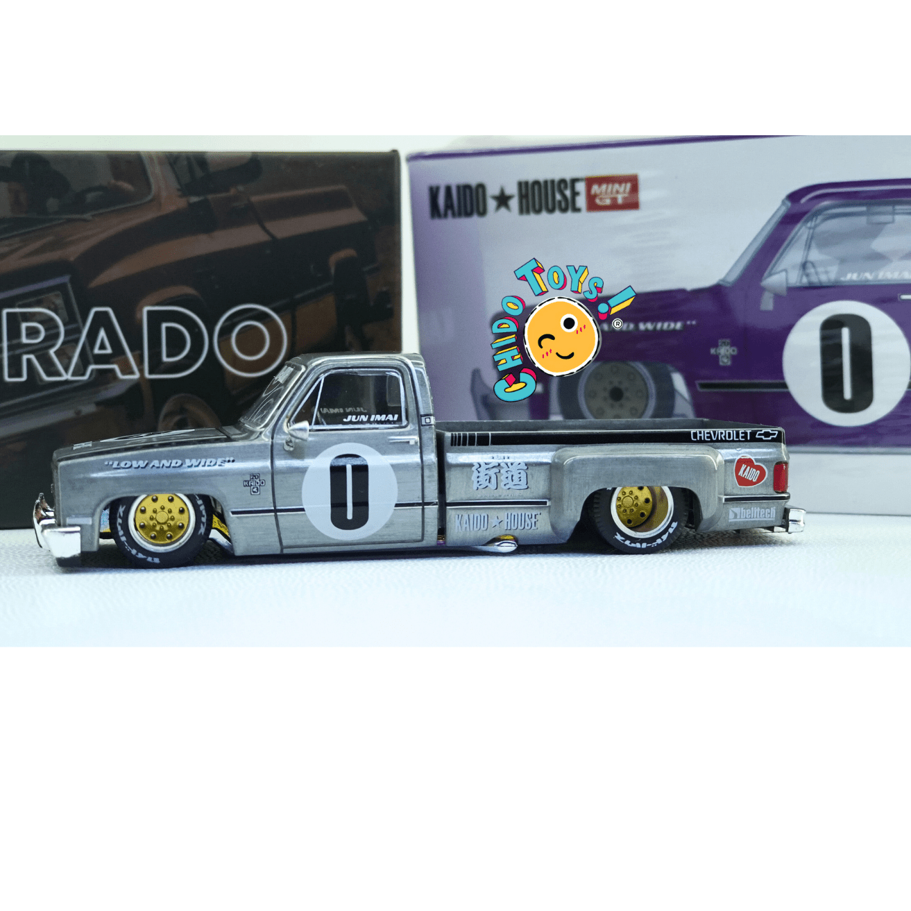 Kaido House 084 Chevrolet Silverado Dually Primera Edición CHASE 1:64 - Chido Toys