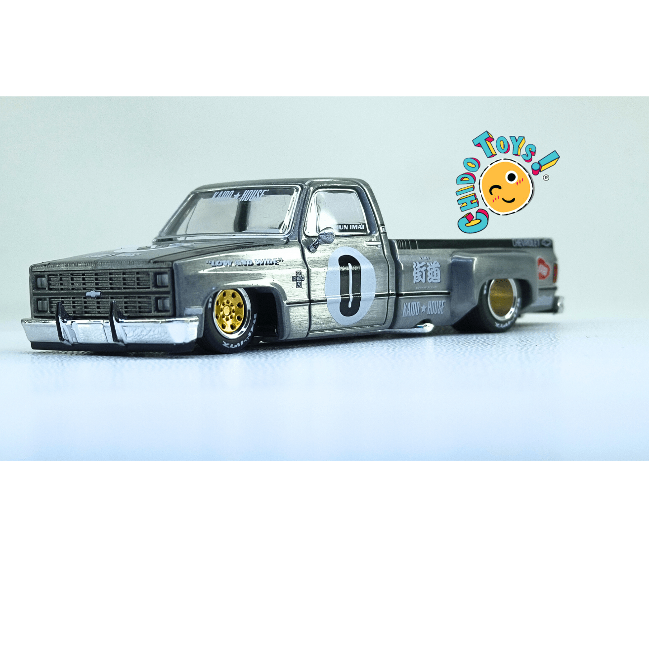 Kaido House 084 Chevrolet Silverado Dually Primera Edición CHASE 1:64 - Chido Toys