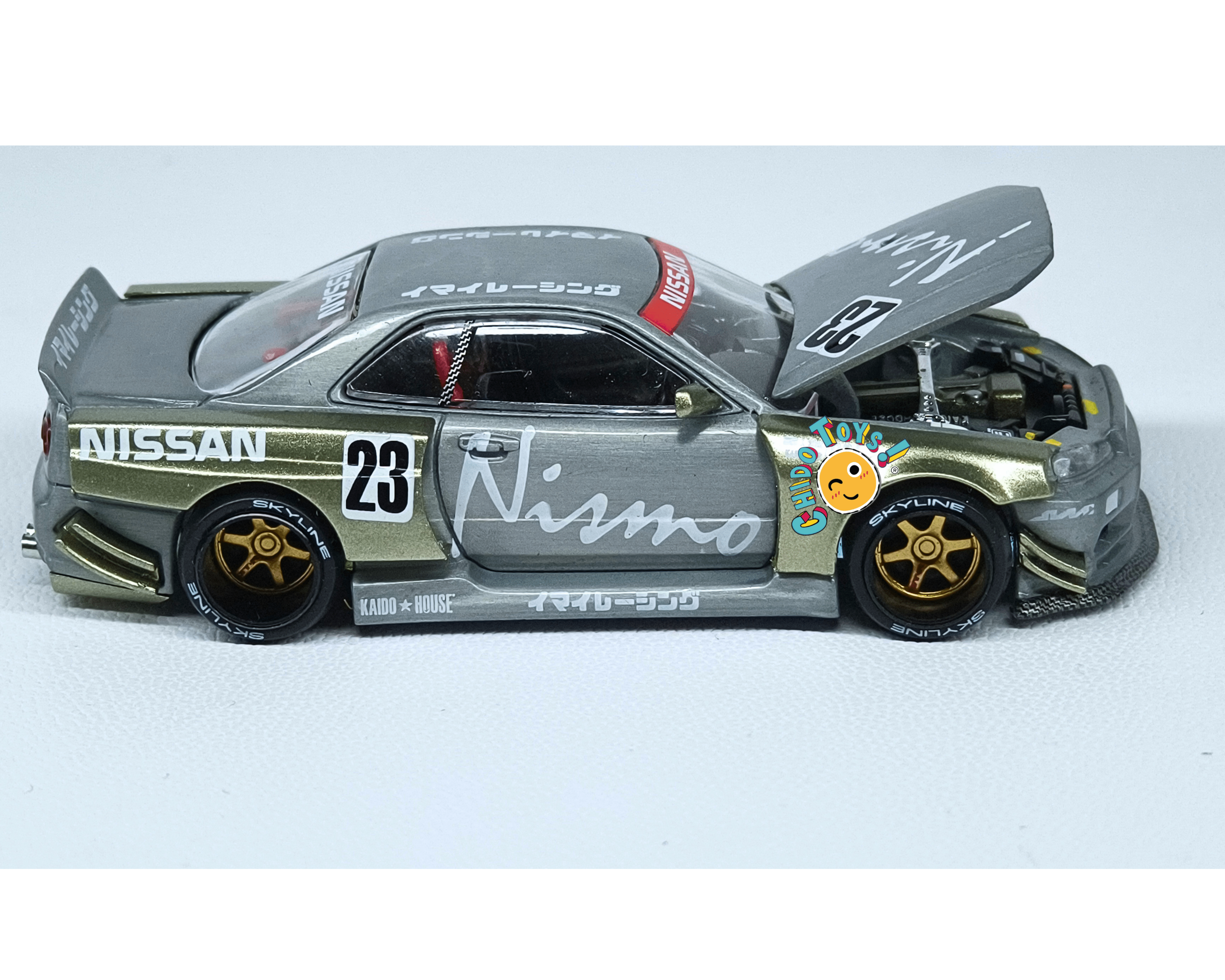 Kaido House 103 Nissan Skyline GT - R R34 Nismo CHASE 1:64 metal expuesto - Chido Toys