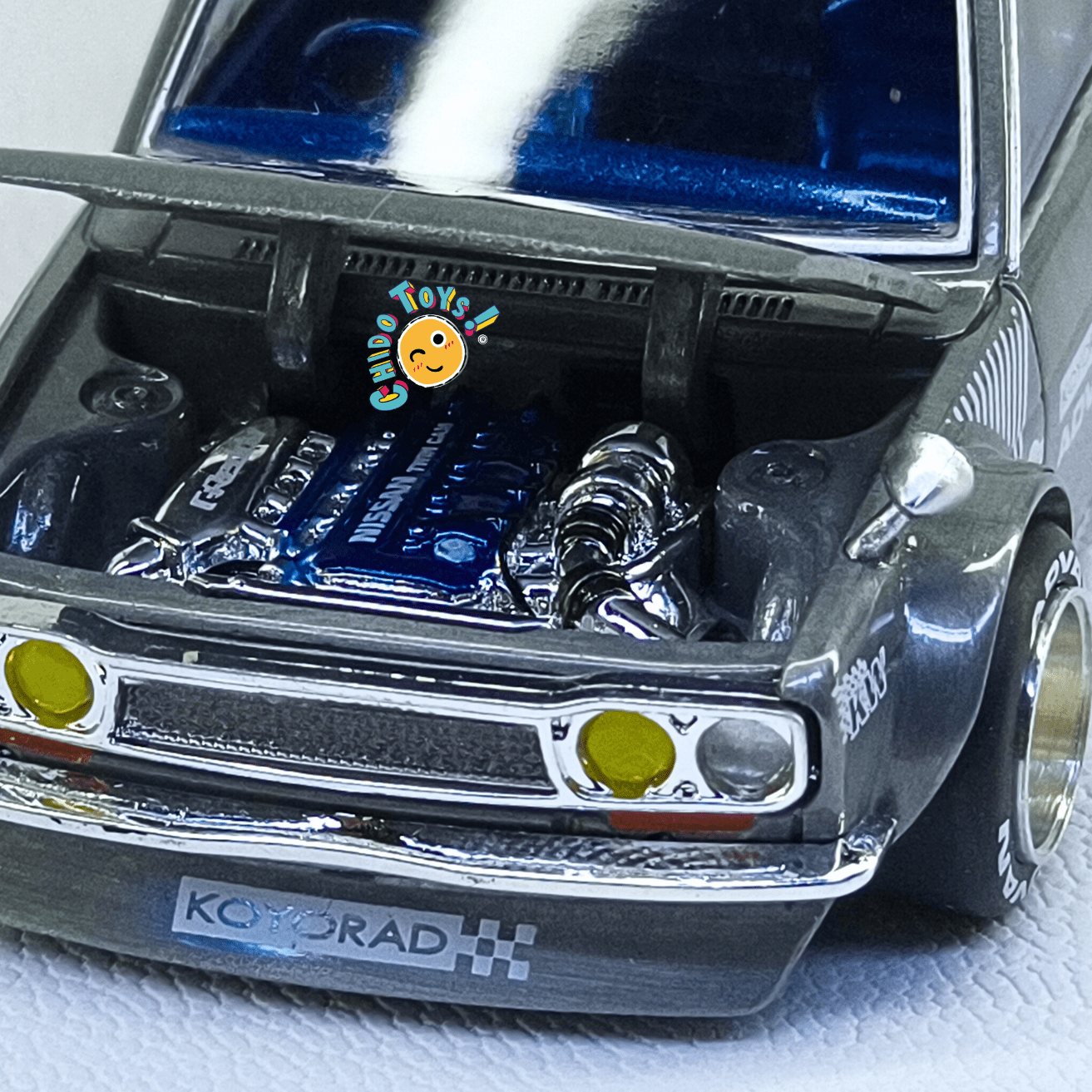 Kaido House Datsun 510 Wagon CHASE 1:64 gris metálico - Chido Toys