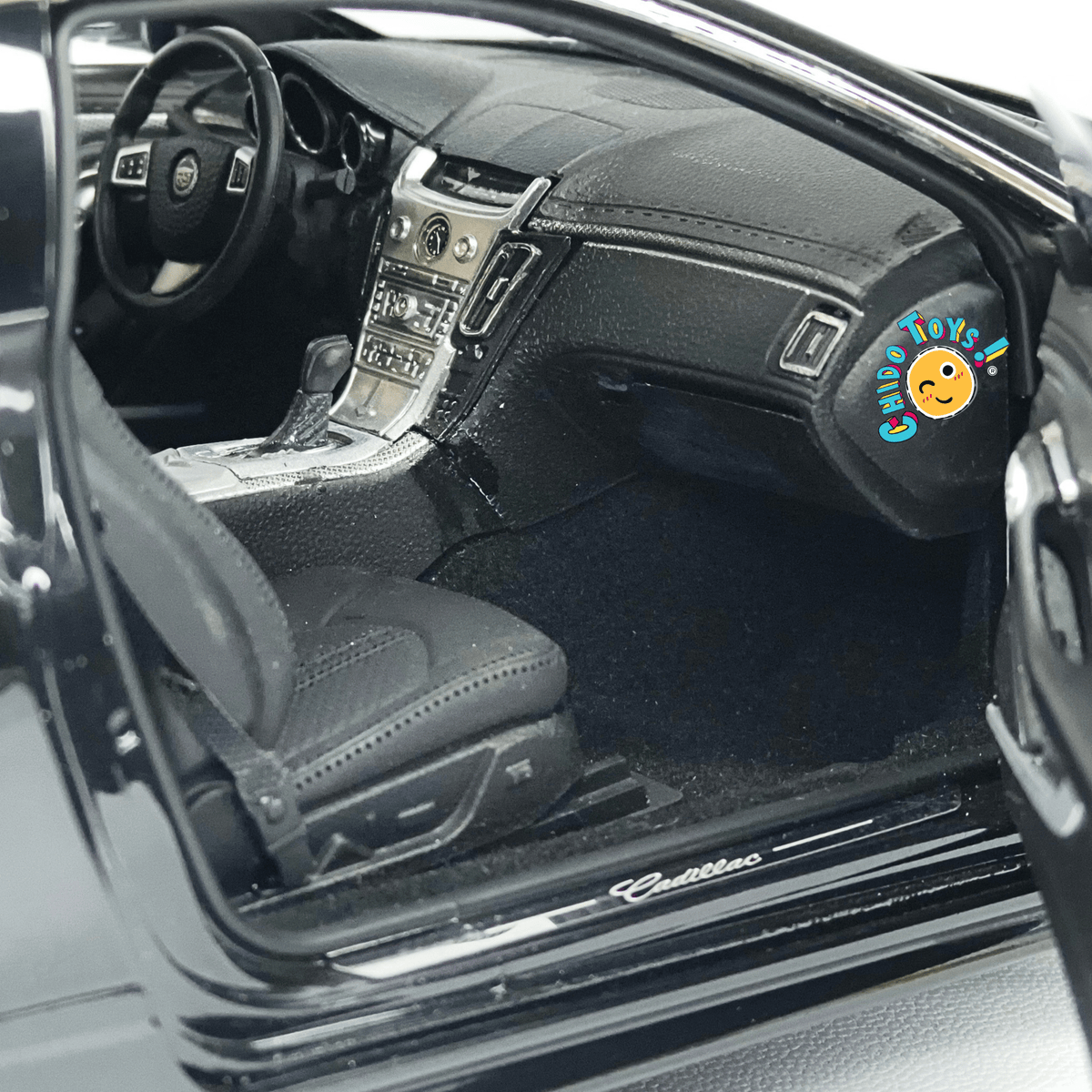 Kyosho Cadillac CTS Coupé 1:18 Black Metallic con apertura total - Chido Toys