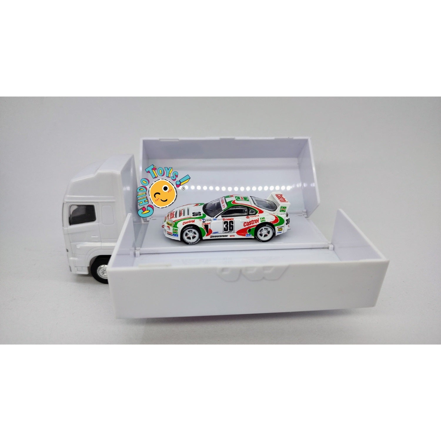 Auto a escala marca Tarmac Works, Modelo Toyota Supra GT JGTC 1995 M. Sekiya / M. Krumm con embalaje de camión