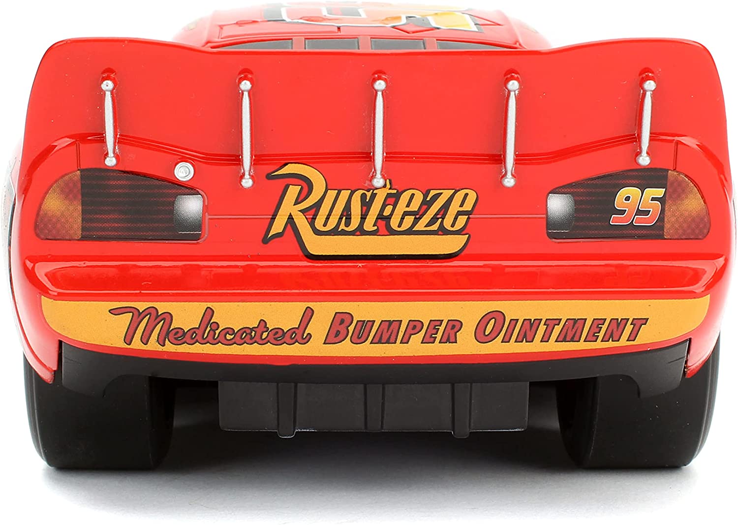 Lightning McQueen Exclusive Tire Rack Edition 1:18 con estantería - Chido Toys