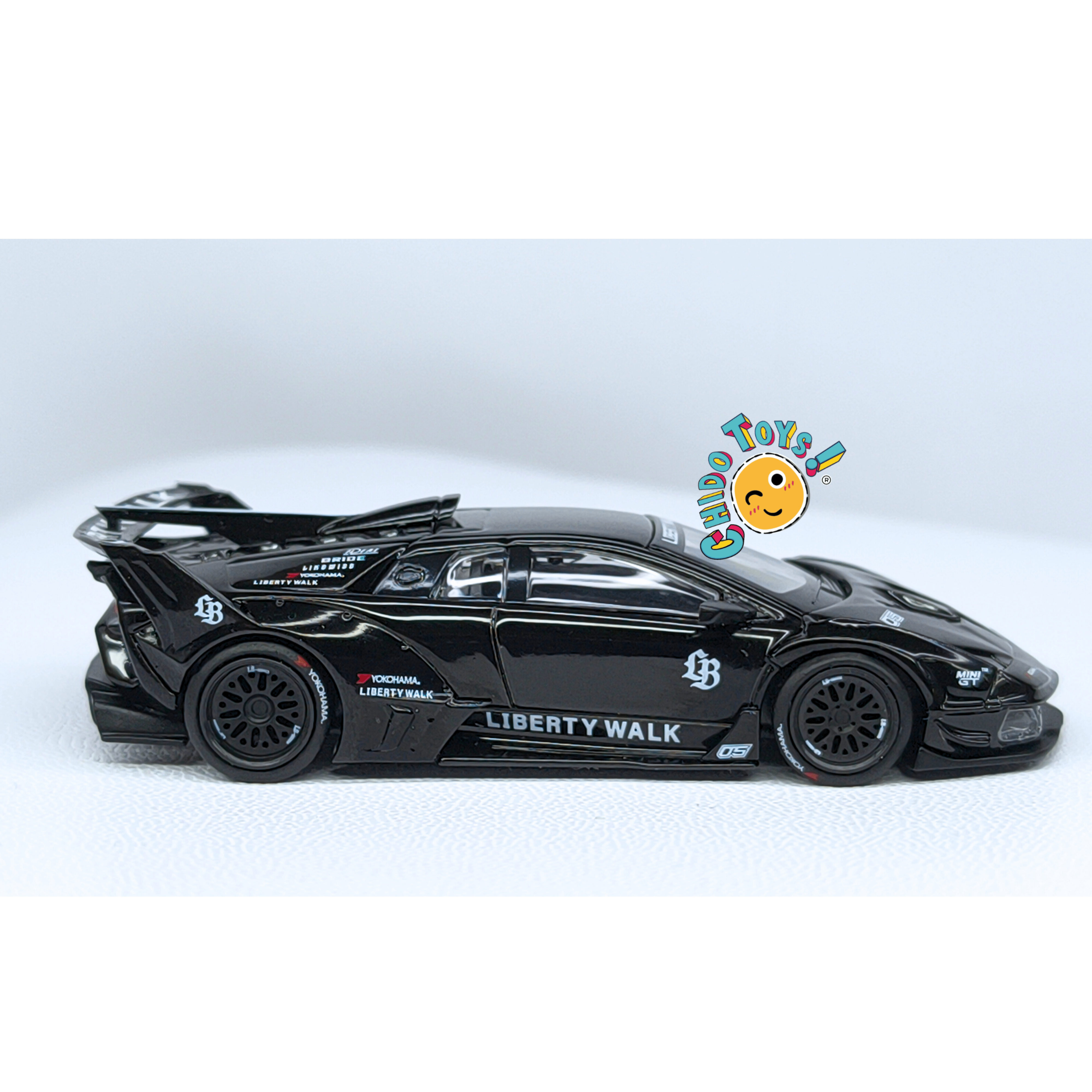 Mini GT Lamborghini Diablo GT LB - WORKS 1:64 negro, PRIMERA EDICIÓN. - Chido Toys
