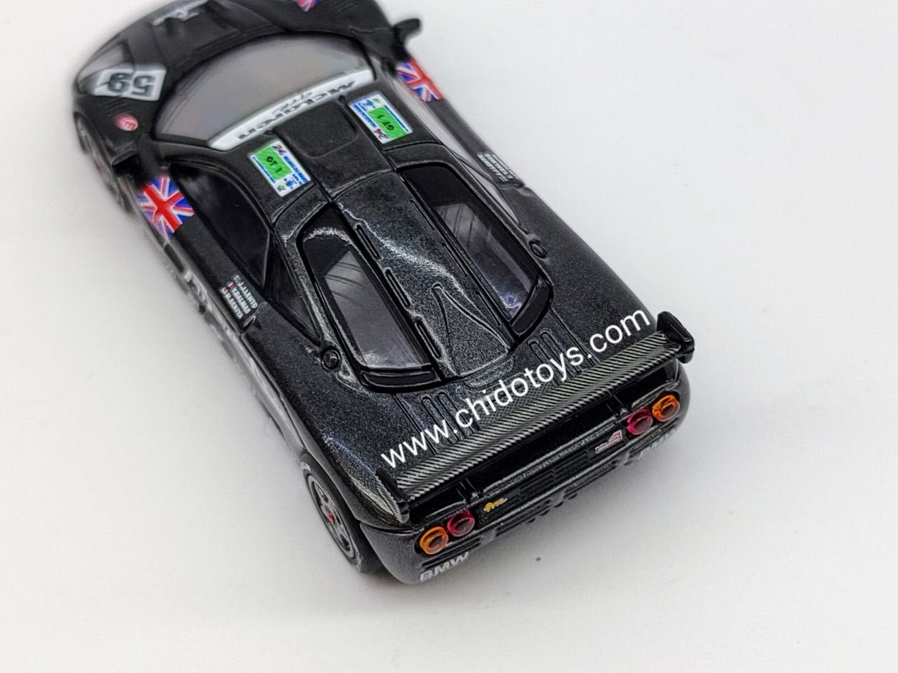 Mini GT McLaren F1 GTR Ueno Clinic 1:64 negro Le Mans - Chido Toys