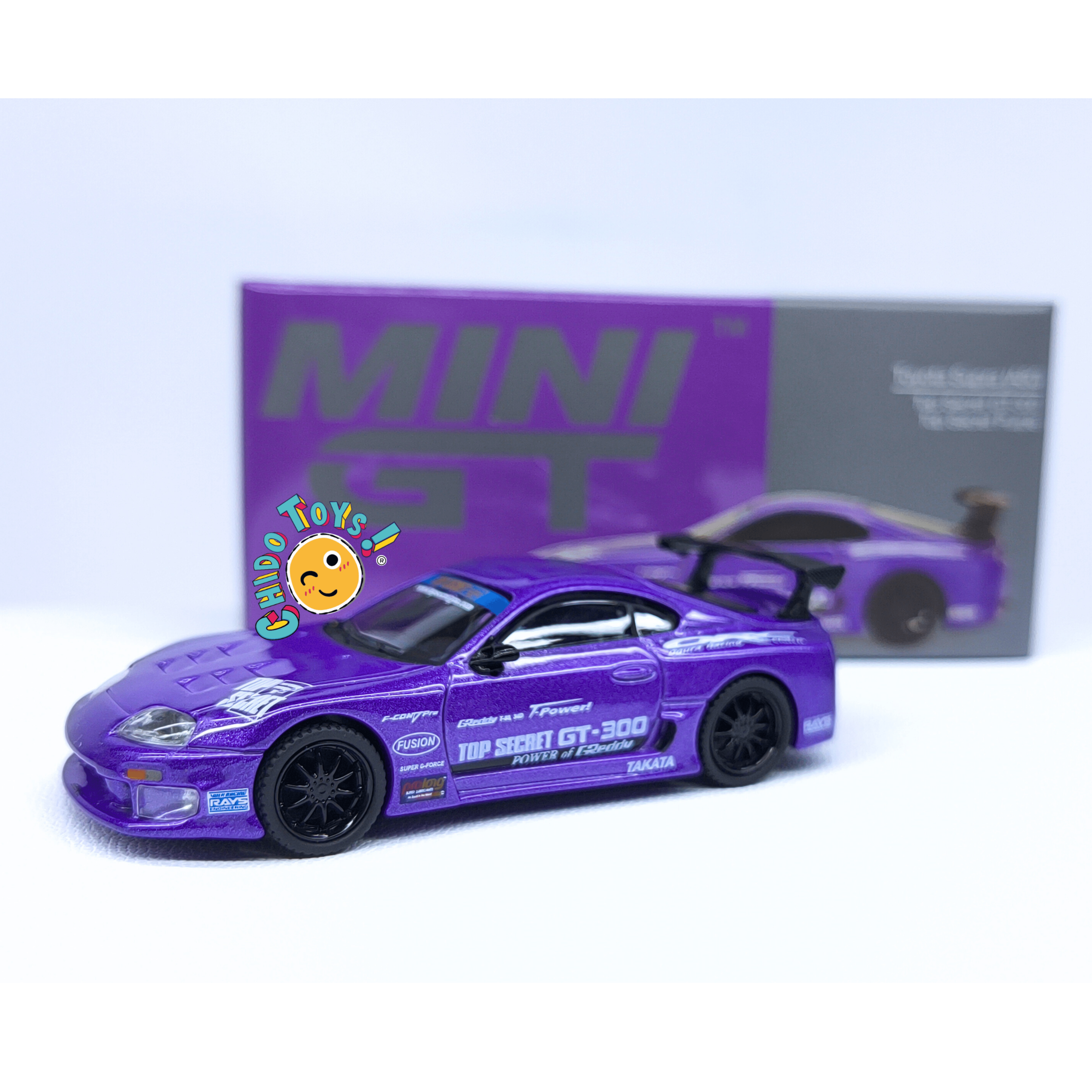 Mini GT Toyota Supra Top Secret 1:64 GT - 300 morado - Chido Toys