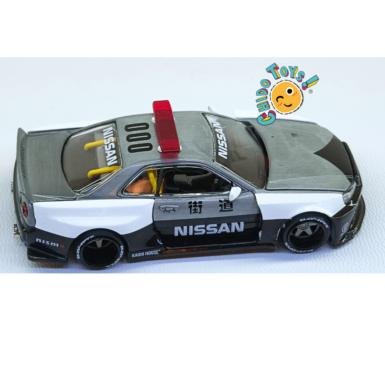 Nissan Skyline GT - R R34 Kaido Works V2 Aero Japan Police – Versión CHASE | Mini GT x Kaido House | 1:64 - Chido Toys