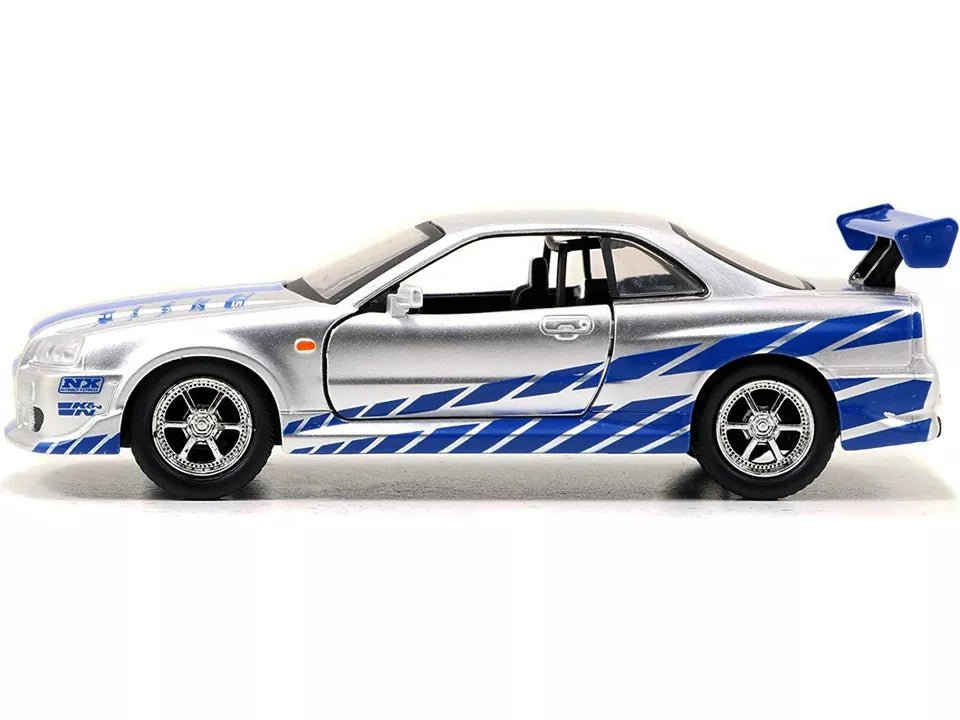 Nissan Skyline – Jada 1:32 (Metal, Llantas de Goma, Apertura de Puertas) - Chido Toys
