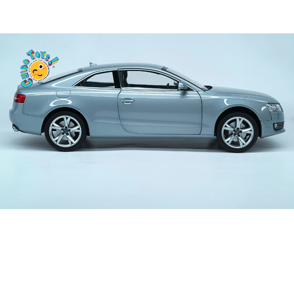 Norev Audi A5 Coupé 2007 1:18 Monza Silver con apertura total - Chido Toys