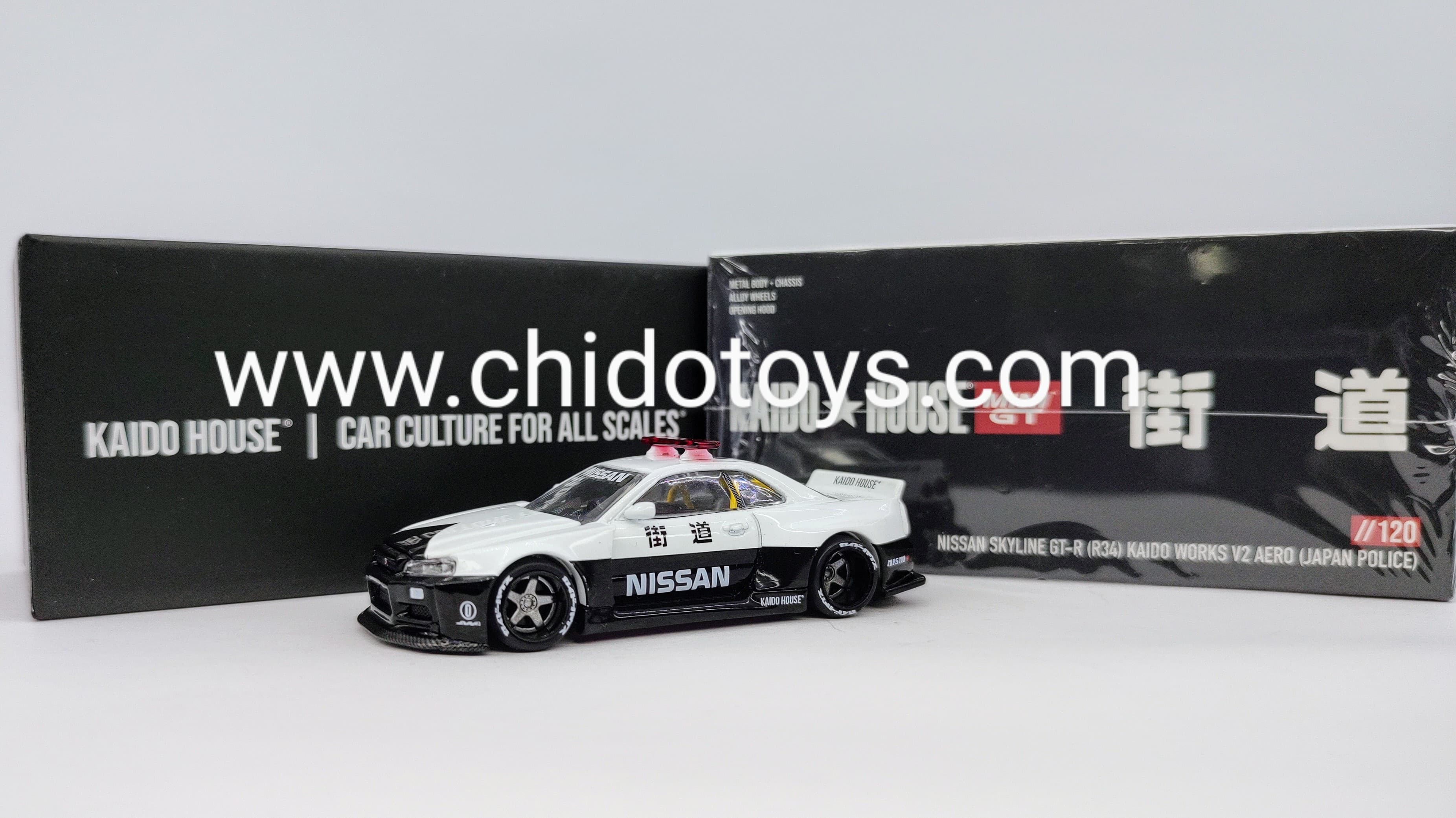 Patrulla a escala marca Kaido House, Modelo Nissan Skyline GT - R (R34) V2 AERO (JAPAN POLICE) - Chido Toys