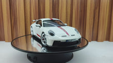 Cargar y reproducir el video en el visor de la galería, Auto a escala 1:18, marca Norev, Modelo Porsche 911 GT3 2021
