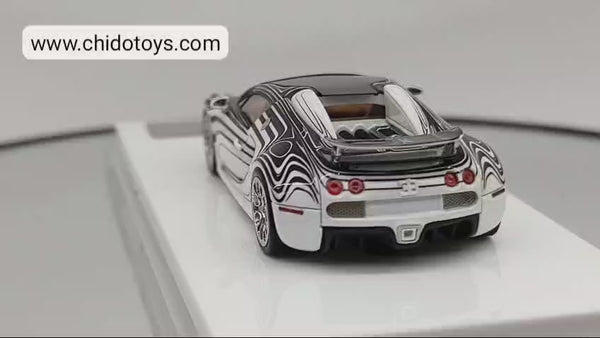 Auto a escala marca LJM Modelo Bugatti  Veyron L´or Blanc (brilla en la oscuridad)