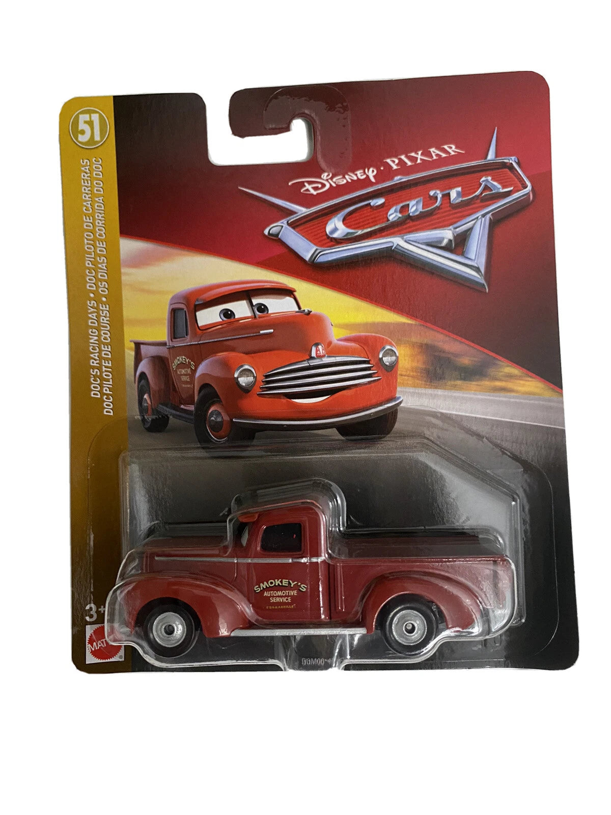 Smokey Doc’s Racing Days Disney Pixar Cars escala 1:55 Mattel, camioneta pickup color cobre rojizo con logotipo Smokey’s Automotive Service.
