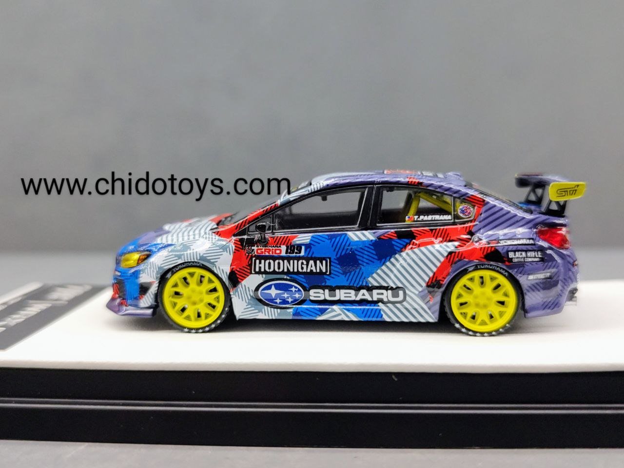 TPC Subaru WRX STI Travis Pastrana 1:64 edición limitada - Chido Toys