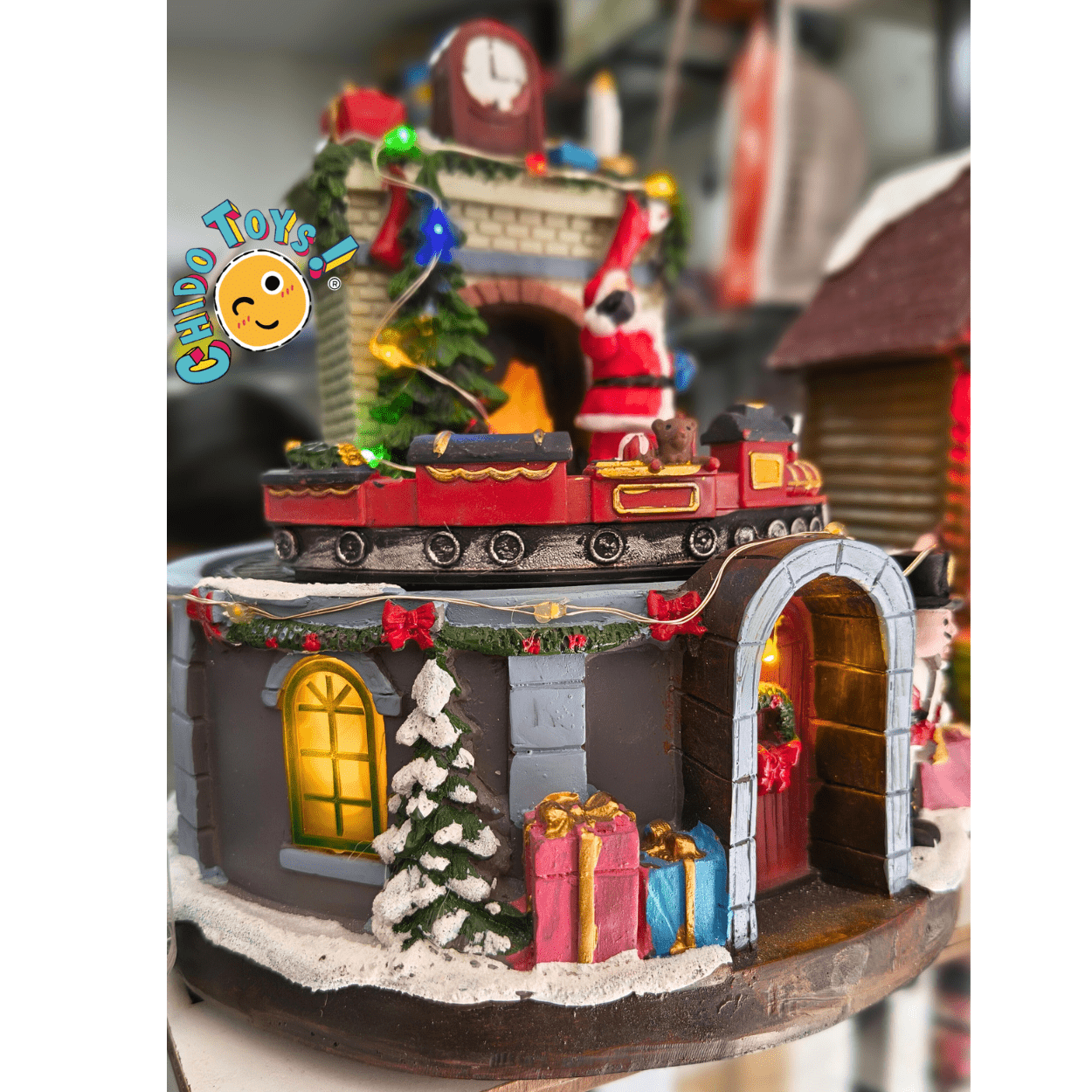 Villa navideña con tren — Luz LED y música (USB) 16×18 cm - Chido Toys