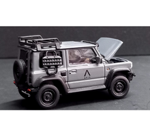 Cargar imagen en el visor de la galería, Auto a escala marca Era Car, Modelo Suzuki Jimny Sierra, edad 14+, color gris

